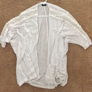 cream colored cardigan